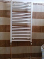 Montare radiator scăriță baie